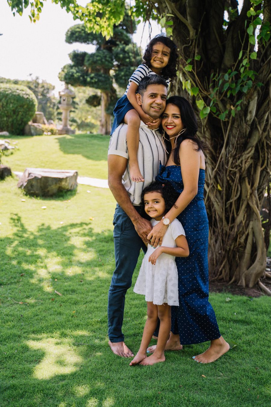 The source photo — a family of four in the park